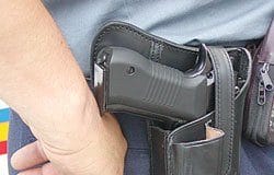 polițist pistol foc armă