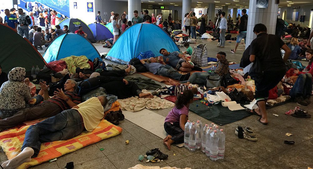 refugiati migranti
