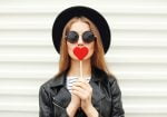 Fashion,Portrait,Pretty,Sweet,Young,Woman,Having,Fun,With,Lollipop